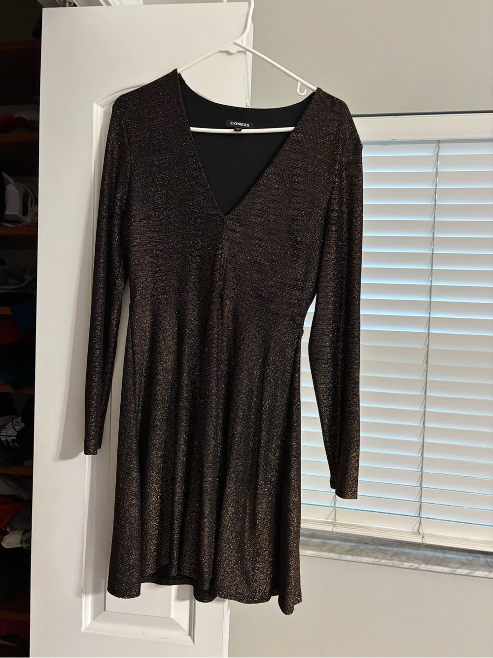Express Long Sleeve Metallic V-Neck Skater Dress in gold and black